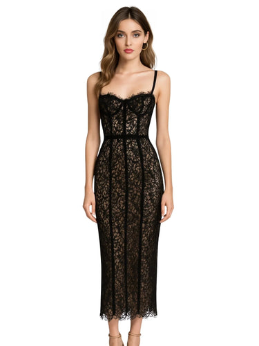 Woman wearing a black lace dress on a white background